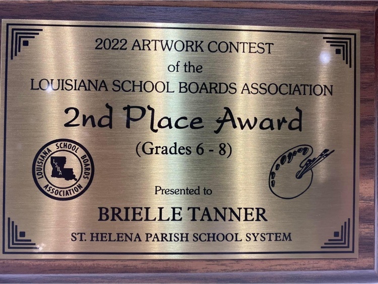This is an image of the plaque that was awarded to Brielle Tanner. it reads the Louisiana school board associations artwork contest second place awarded to Brielle Tanner six through eighth grade. Saint Helena parish school system